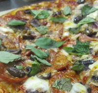Mezzadellas Woodfired Pizza and Tapas - Rental Cars