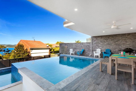 Blue Water Splendour - Infinity Pool And Amazing Views!! - Rental Cars 1